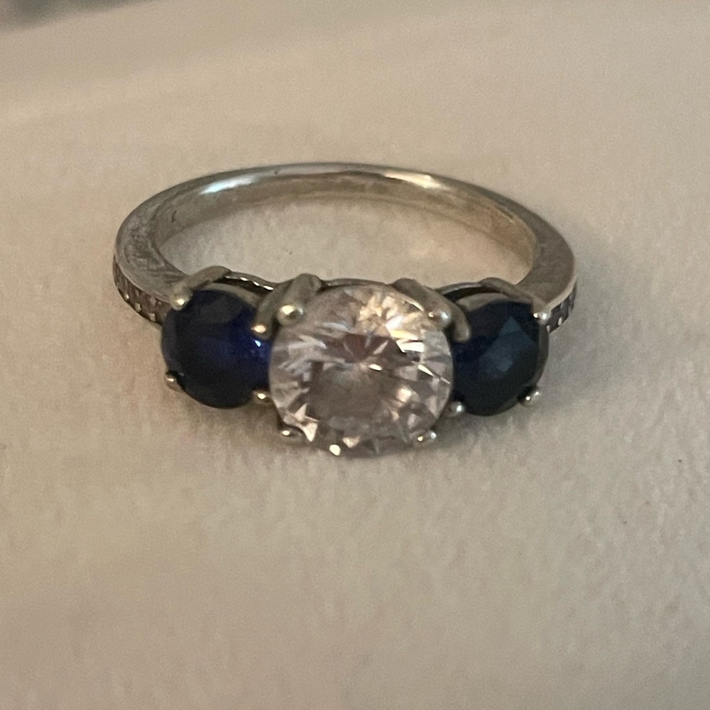 Blue Sapphire and Man Made Diamond Simulant
Trilogy 3 stone Ring